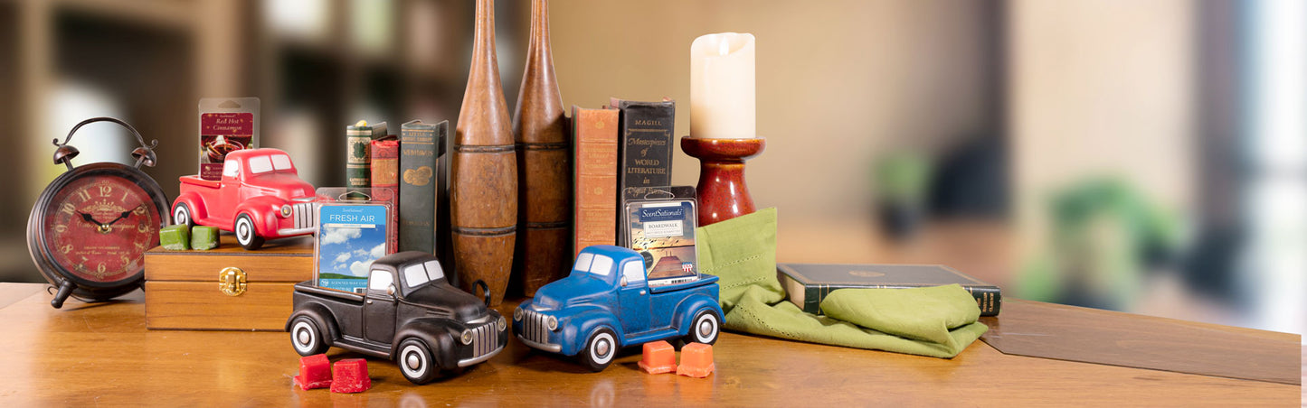 table with candle and toy cars
